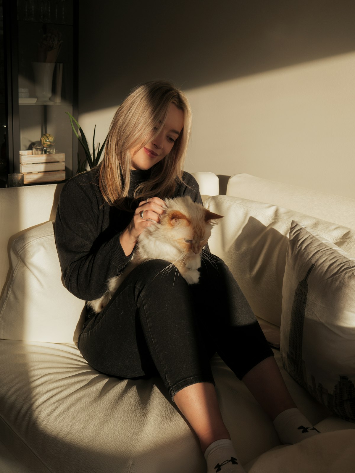 A family relaxing at home with their dog